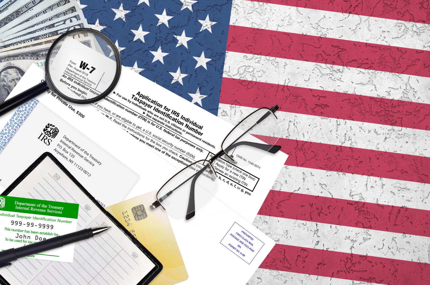 W-7 Tax Form Magnified Over American Flag Background