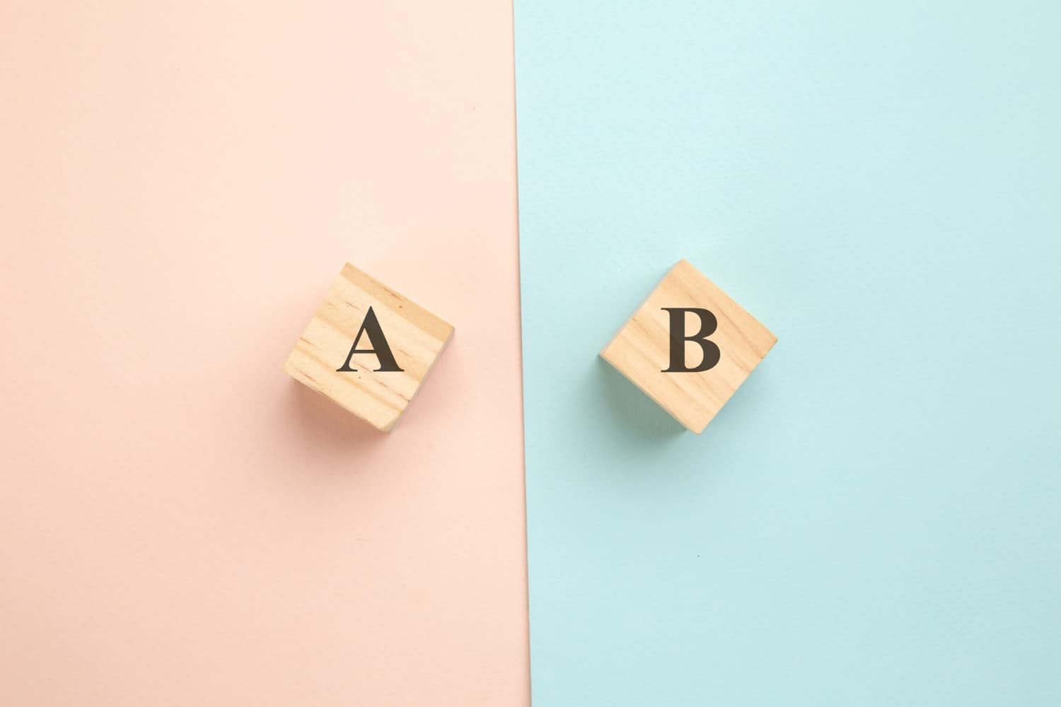 Wooden Blocks With Letters A And B On Pastel Background